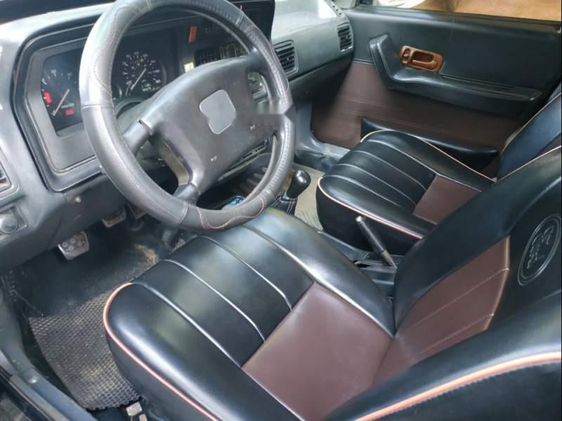 Bán Ford Tempo đời 1987 đăng ký 1993, màu đen, sơn nhà hơi xấu, nhập khẩu nguyên chiếc