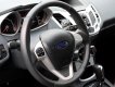 Ford Fiesta 2011 - Gia đình cần bán Ford Fiesta 2011 Hatchback, số tự động, màu trắng