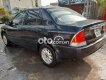 Ford Laser 2001 - Cần bán lại xe Ford Laser năm 2001, màu đen, nhập khẩu nguyên chiếc 