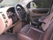 Ford Escape 2005 - Màu đen, giá 165 triệu